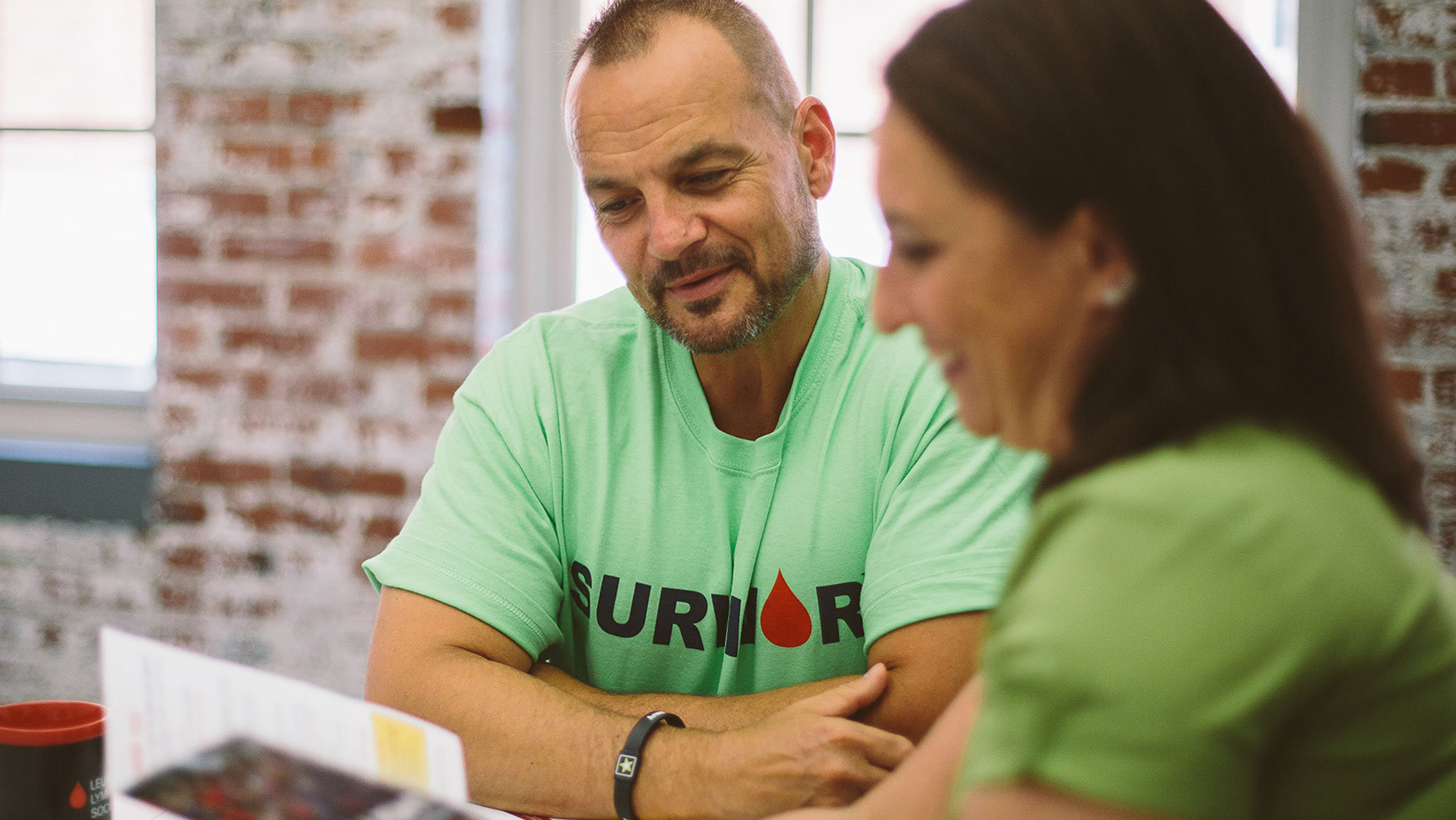 Chuck and another person reading a document